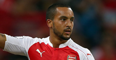 Theo Walcott In action against Everton in the Asia Trophy final