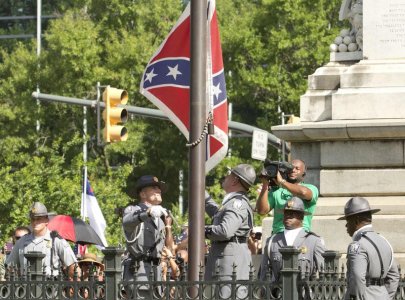 The Confederate battle flag is permanently removed from the South Carolina statehouse grounds during a ceremony in Columbia South Carolina July 10 2015. REUTERS  Jason Miczek