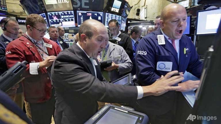 Traders work on the floor of the New York Stock Exchange.
   
 

  Enlarge  Caption