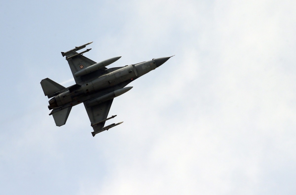 A missile-loaded Turkish Air Force warplane takes off from the Incirlik Air Base in the outskirts of the city of Adana southeastern Turkey Tuesday