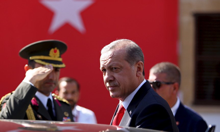 Turkey's President Tayyip Erdogan looks on durin his visit to Northern Cyprus