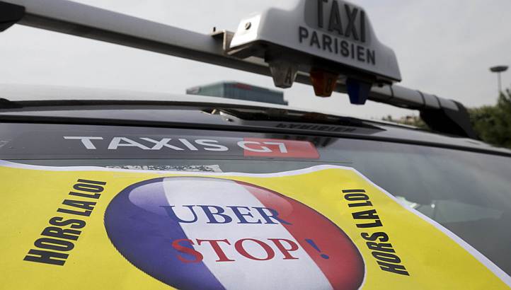 French president rails against Uber amid taxi tensions