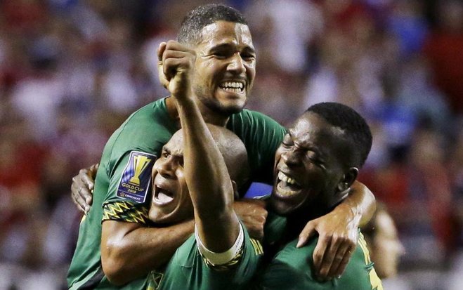 Jamaican players celebrate their 2-1 victory over the U.S. Wednesday in Atlanta