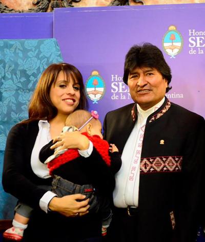 Victoria Donda Perez poses with her baby and Bolivian President Evo Morales