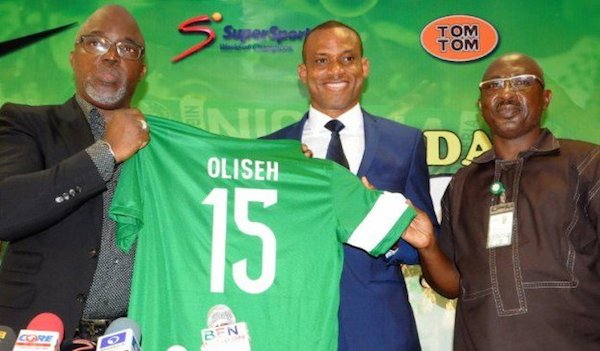 L-R Amaju Pinnick president Nigeria Football Federation; Sunday Oliseh new coach Super Eagles of Nigeria and Mohammed Sanusi general-secretary NFF during the inauguration of Oliseh as Super Eagles new coach in Abuja