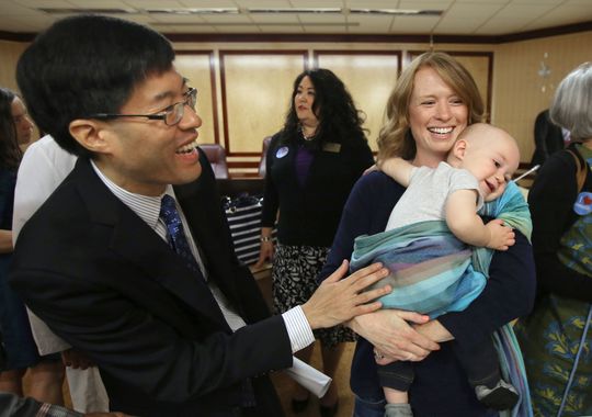 Sen Richard Pan D-Sacramento left talks with Jennifer Wonnacott a supporter of Pan's measure requiring California schoolchildren to get vaccinated after the bill was approved by the state Senate