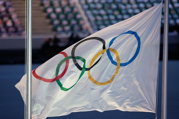 The Olympic Flag waves as part of the 2014 Sochi Winter Olympics Closing Ceremony at Fisht Olympic Stadium