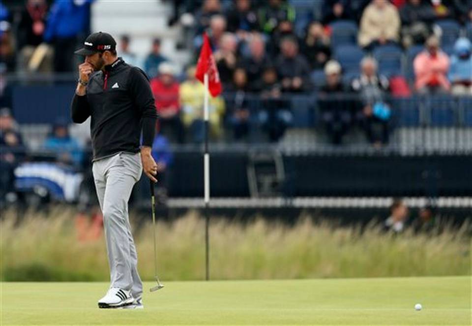 United States’ Dustin Johnson reacts on the sixth green during the third round of the British Open Golf Championship at the Old Course St. Andrews Scotland Sunday