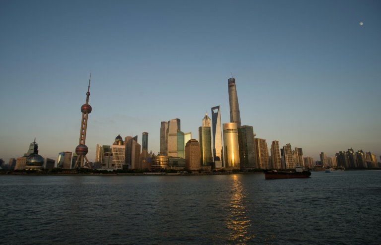 China's three-decade economic boom which has transformed cities such as Shanghai is at risk the World Bank warns urging reform of state-dominated financial sector