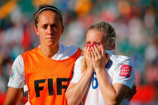 World of woe Laura Bassett of England is comforted by Jo Potter after their World Cup exit