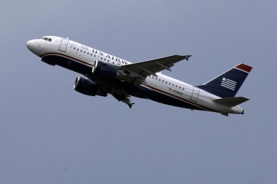 American Airlines and US Airways to start merging reservation systems