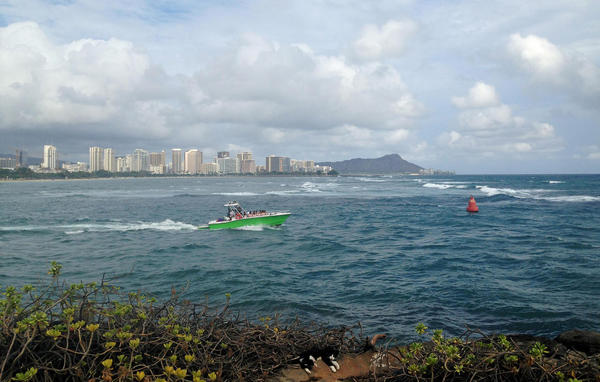 A boat maneuvers out to sea near Point Panic in Honolulu Monday Aug. 24 2015. Cathy Bussewitz Associated Press Enlarge