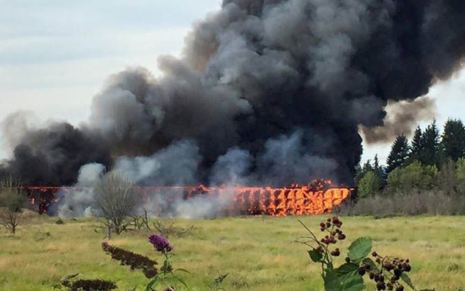 A grass fire spread to a train trestle in Sherwood Monday afternoon