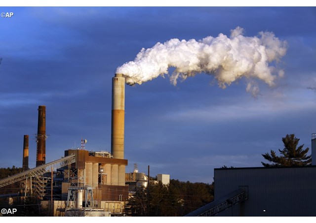 A plume of steam from the coal-fired Merrimack Station in Bow New Hampshire- AP