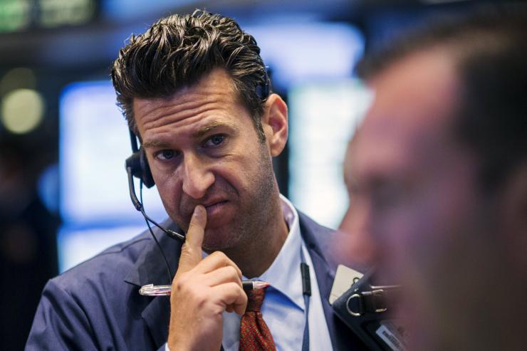 A trader works on the floor of the New York Stock Exchange shortly after the opening bell in New York Tuesday Aug. 18 2015.   
           
    Reuters  Lucas Jackson