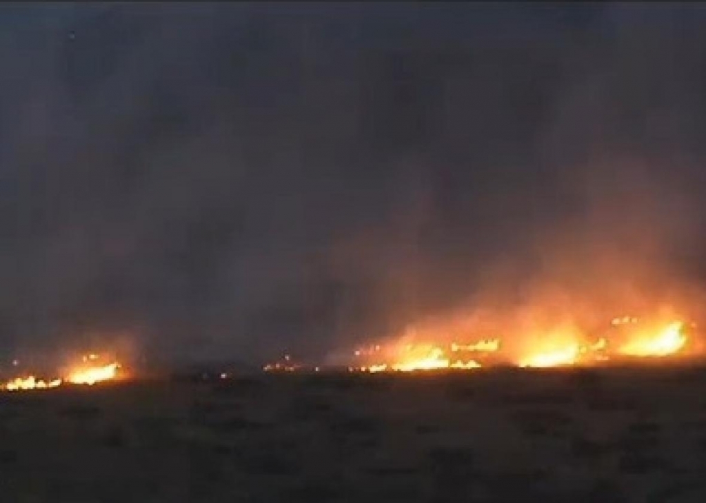 A wildfire burning in Washington state killed three U.S. Forest Service firefighters this week. Image via KQNT video