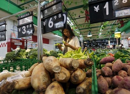 UK-CHINA-ECONOMY-INFLATION:China producer prices slide to six-year low in July