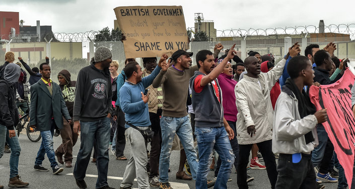 Calais on the occasion of the visit of Britain's Home Secretary visit to Calais to sign a deal aimed at alleviating the migrant crisis