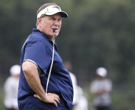 New England head football coach Bill Belichick watches drills during a joint practice between the Patriots and New Orleans Saints at the Saint's NFL football training camp in White Sulphur Springs