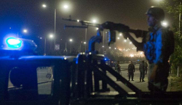 Afghanistan soldiers guard police academy after suicide attack. Kabul Afghanistan