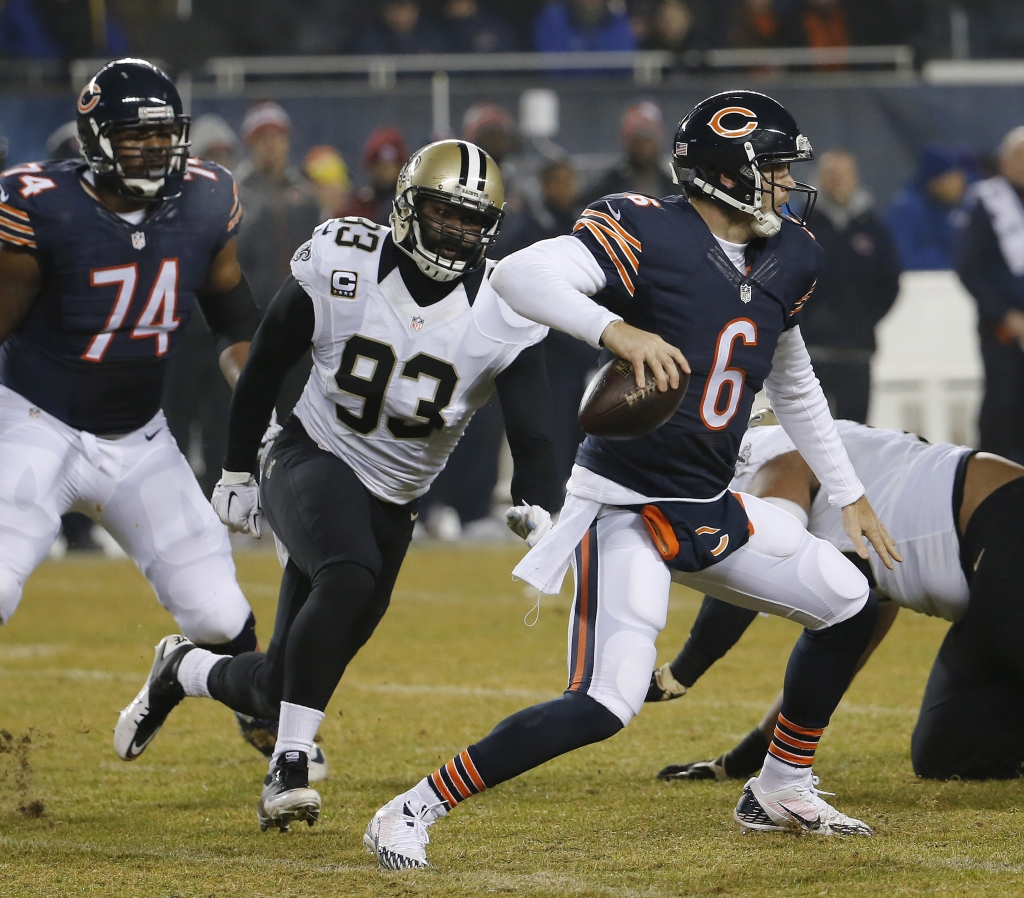 New Orleans Saints outside linebacker Junior Galette chases Chicago Bears quarterback Jay Cutler before a sack during the first half of an NFL football game in Chicago. Galette agreed to a one-year contrac