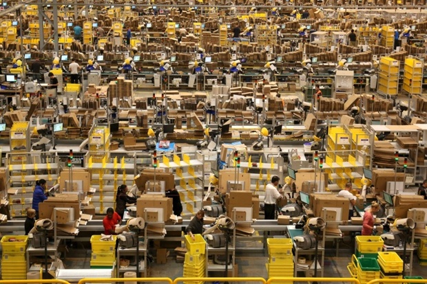 An Amazon centre in Peterborough where workers pack orders on the warehouse floor