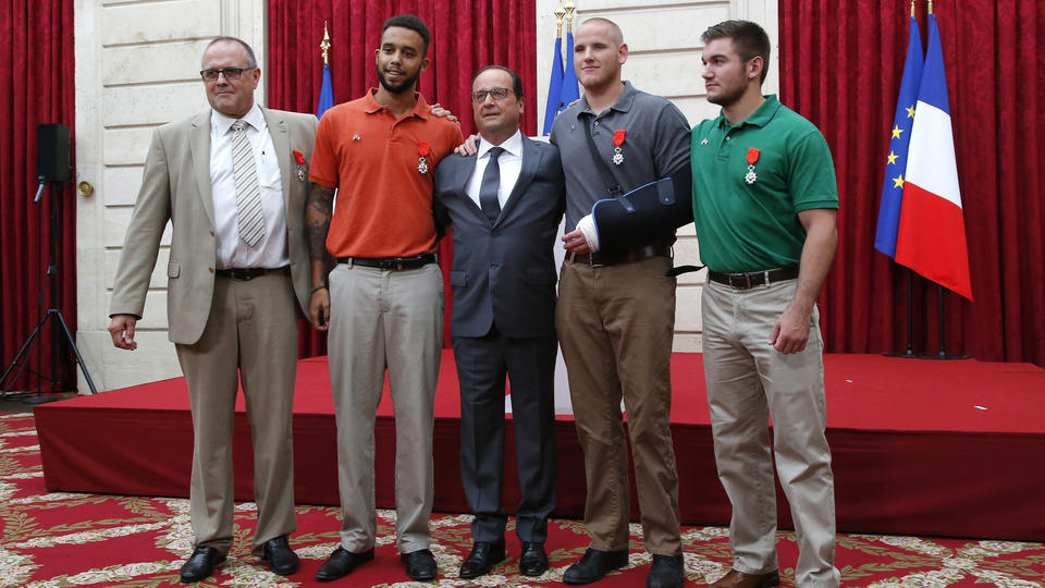 From the left British businessman Chris Norman Anthony Sadler a senior at Sacramento University in California French President Francois Hollande U.S. Airman Spencer Stone and Alek Skarlatos a U.S. National Guardsman from Roseburg Oregon pose at