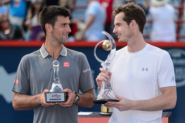 Andy Murray with his winner’s trophy after beating Novak Djokovic at the Rogers Cup final