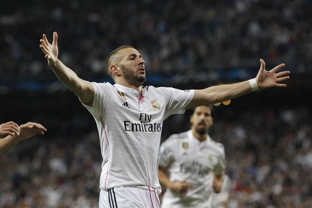 Karim Benzema of Real Madrid celebrates after scoring his team's third goal