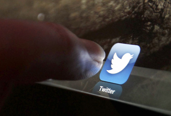 Twitter shares fall below IPO price on user growth worries