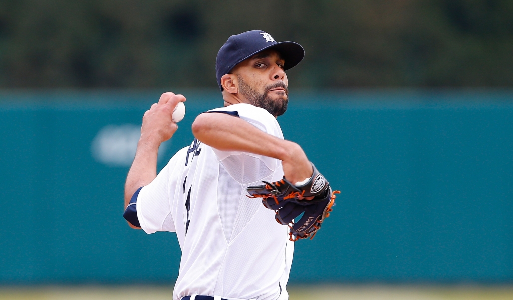 DETROIT MI- APRIL 6 David Price #14 of the Detroit Tigers warms up prior to the start of the Opening Day game against the Minnesota Twins at Comerica Park