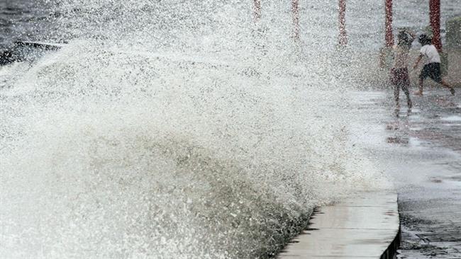 Big waves crash at the coast due to strong winds brought by typhoon Goni in the Philippines