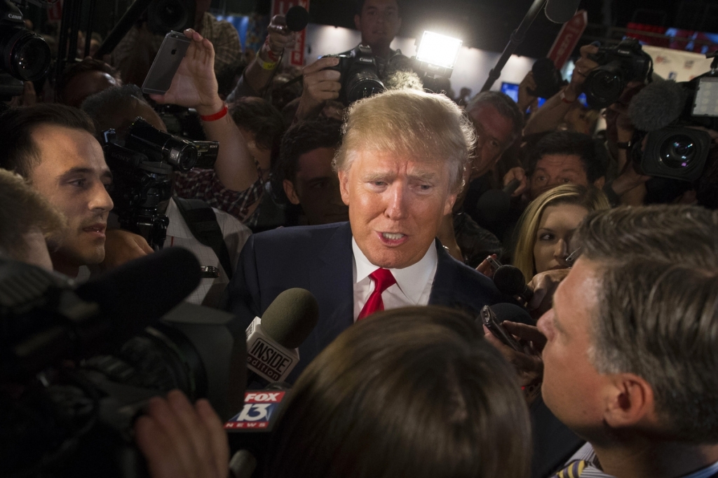 Republican presidential candidate Donald Trump speaks to the media Aug. 6 in the spin room after the first Republican presidential debate at the Quicken Loans Arena in Cleveland. Trump is showing no signs of curbing his battle with a Fox News television