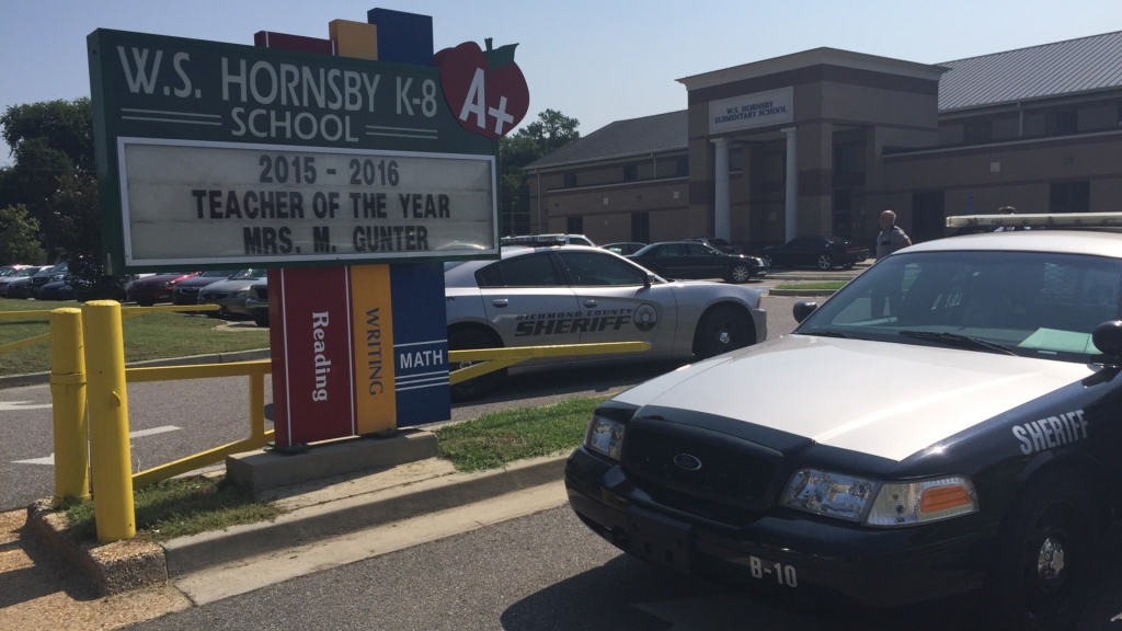 Sheriff's Office vehicles at W.S. Hornsby K-8 School in Augusta Georgia after a student was accidentally shot by another student on Tuesday