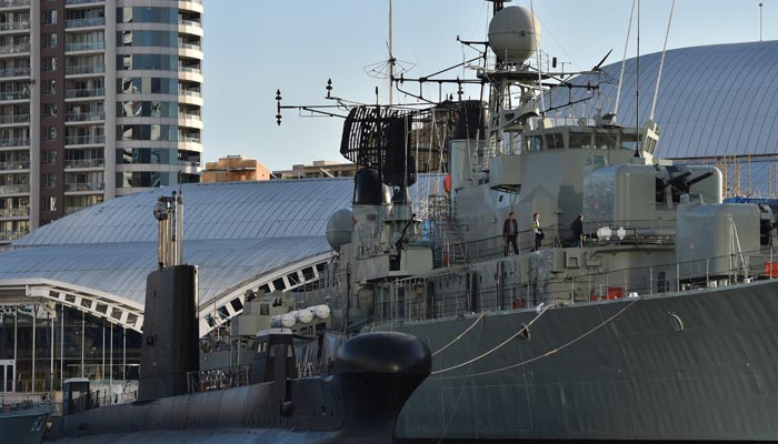 Australia spends $65bn on navy upgrade but submarine deal stalks PM