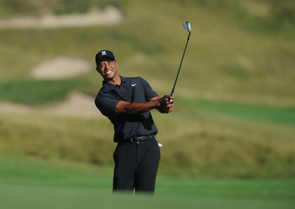 Aug 12 2015 Sheboygan WI USA Tiger Woods chips onto the 16th green during a practice round for the 2015 PGA Championship golf tournament at Whistling Straits-The Straits Course. Mandatory Credit Thomas J. Russo-USA TODAY Sports