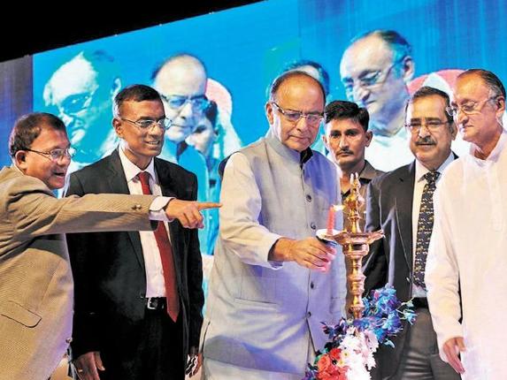 Finance Minister Arun Jaitley lights the lamp to mark the inauguration of Bandhan Bank in Kolkata on Sunday. Also seen are RBI Deputy Governor H.K. Khan MD and CEO Bandhan Bank Chandra Sekhar Ghosh Bank Chairman Ashok Kumar Lahiri and West