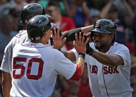 Mookie Betts and Jackie Bradley Jr. celebrated in the third inning after scoring the Red Sox’ eighth and ninth runs