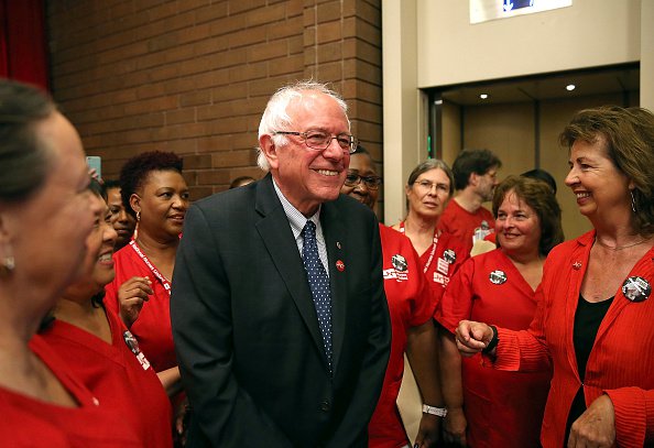 OAKLAND CA- AUGUST 10 Independent presidential candidate U.S. Sen. Bernie Sanders greets nurses as he arrives at a'Brunch with Bernie campaign rally at the National Nurses United offices