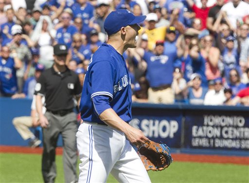 Toronto Blue Jays pitcher Aaron Sanchez reacts after being ejected from a baseball game against the Kansas City Royals for throwing at Royals batter Alcides Escobar in the eighth inning in Toronto Sunday Aug. 2 2015. (Fred Thornhill  The Canadian Press