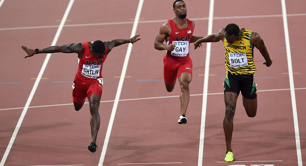 Bolt, Gatlin through to 100 worlds final