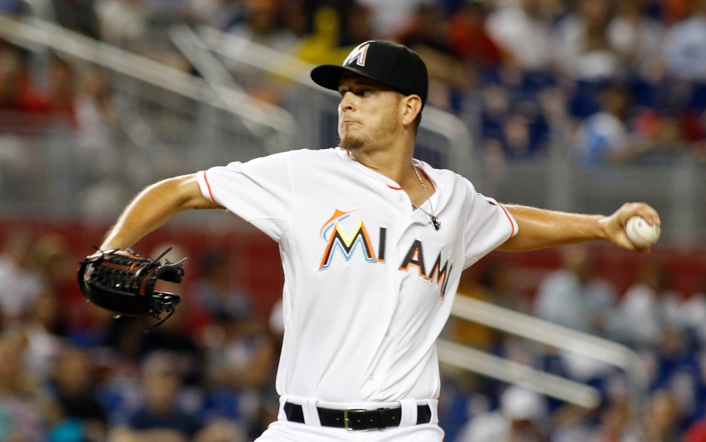 MIAMI FL- AUGUST 11 Starting pitcher Justin Nicolino #60 of the Miami Marlins throws against the Boston Red Sox in the first inning at Marlins Park