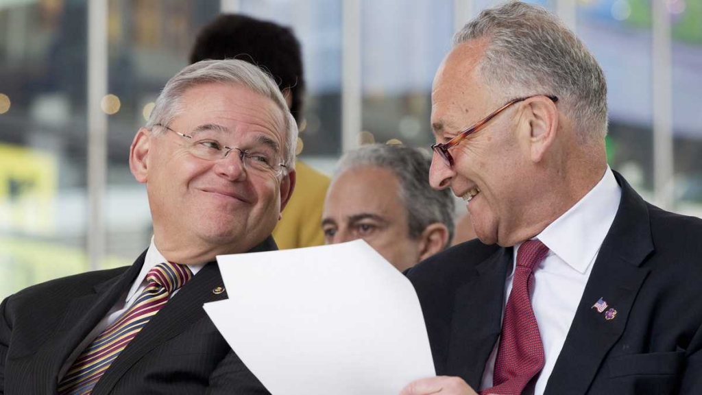 U.S. Sen Bob Menendez left of New Jersey speaks with U.S. Sen. Chuck Schumer of New York in April. Schumer opposes the Iran nuclear deal while Menendez says he will decide by the end of this week