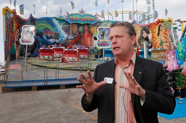 Oklahoma Labor Commissioner Mark Costello speaks during a news conference at the state fairgrounds in Oklahoma City. Authorities say Costello has died after a stabbing at an Oklahoma City restaurant