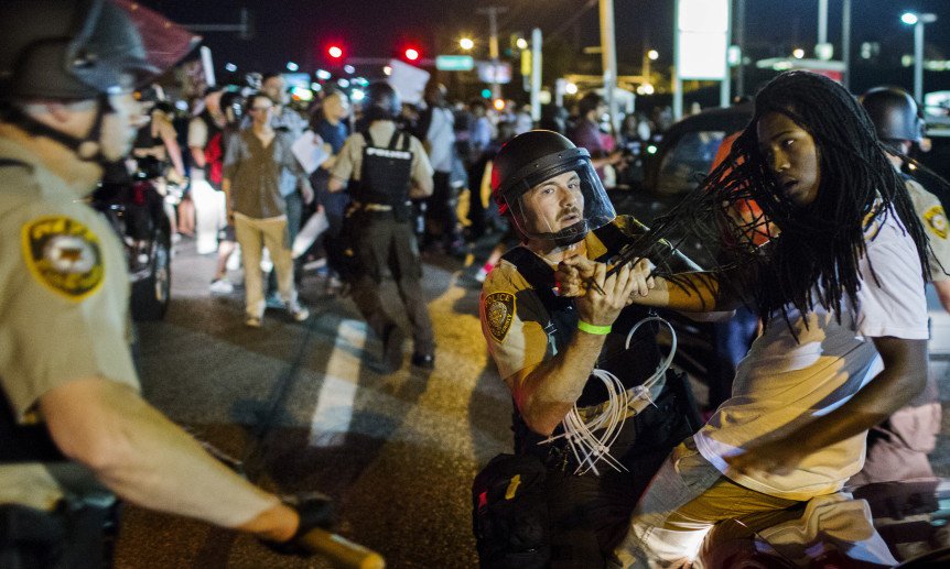 Heavily armed 'Oath Keepers' inject new unease to riot-hit Ferguson