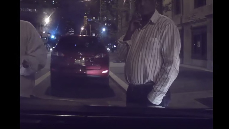 Two alleged taxi drivers block an UberX from leaving with his passenger Aug 12 2015 You Tube screengrab