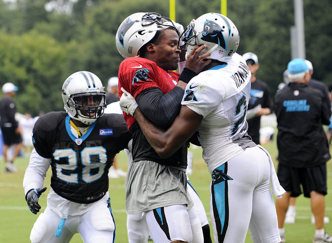 Carolina Panthers Cam Newton and Josh Norman scuffle at the teams NFL football training camp at Wofford College in Spartanburg S.C. Monday Aug. 10 2015. MAGS OUT TV OUT MANDATORY CREDIT