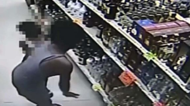 Video shows little girl stealing Tequila from liquor store