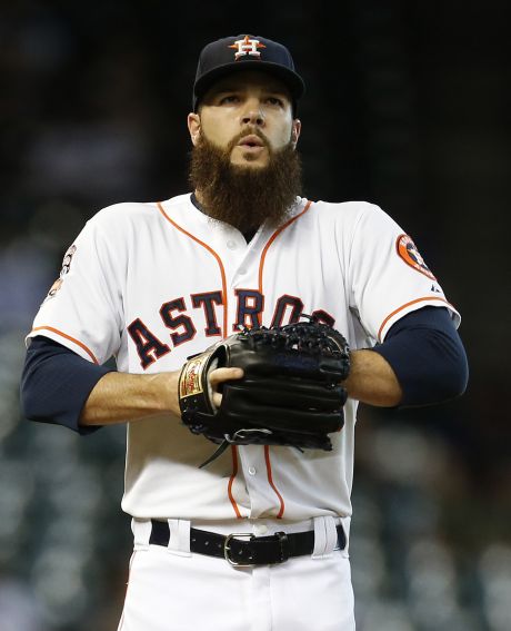 Houston Astros starting pitcher Dallas Keuchel between pitches during the first inning of an MLB game at Minute Maid Park on Wednesday Aug. 19 2015 in Houston