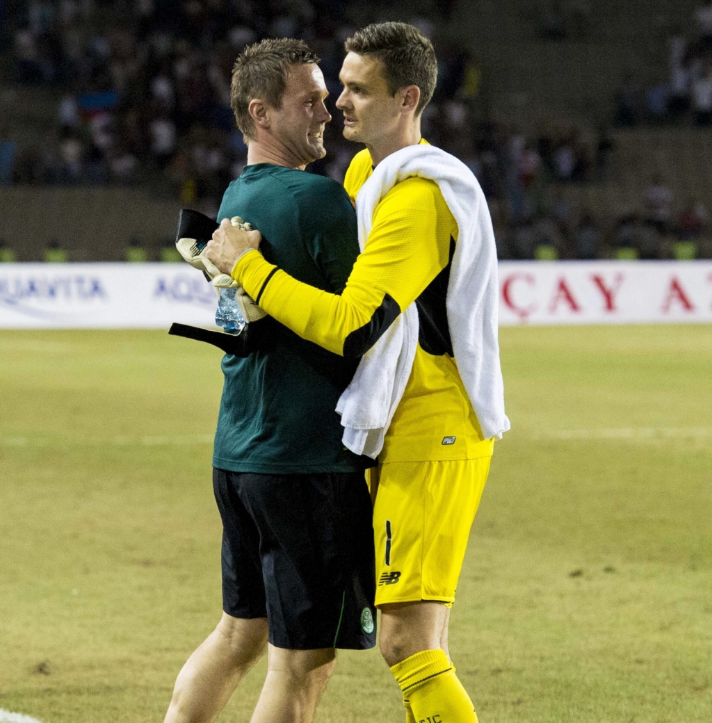 Celtic manager Ronny Deila celebrates with Craig Gordon at full-time in Baku last night